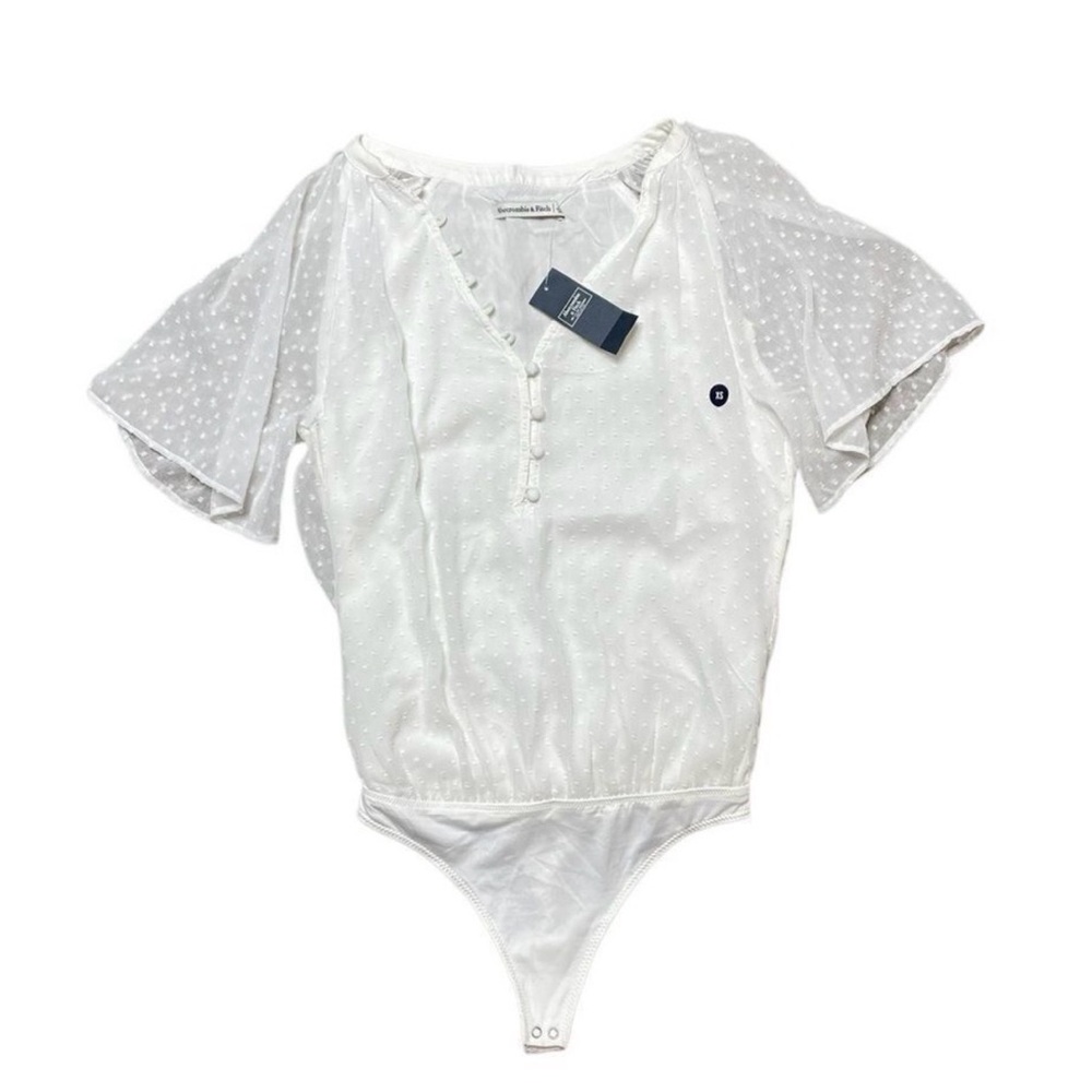 White polka dot Button-Up Bodysuit